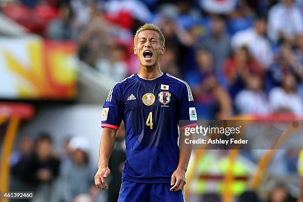 Keisuke Honda of Japan shows emotion after missing a goal during the 2015 Asian Cup match between Japan and Palestine at Hunter Stadium on January...