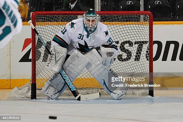 Goalie Antti Niemi of the San Jose Sharks warms up prior to a game against the Nashville Predators at Bridgestone Arena on January 7, 2014 in...