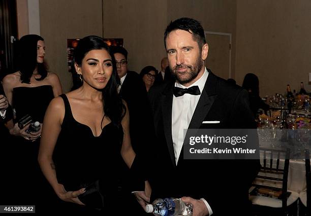 Musician Trent Reznor and Mariqueen Maandig attends the 72nd Annual Golden Globe Awards cocktail party at The Beverly Hilton Hotel on January 11,...