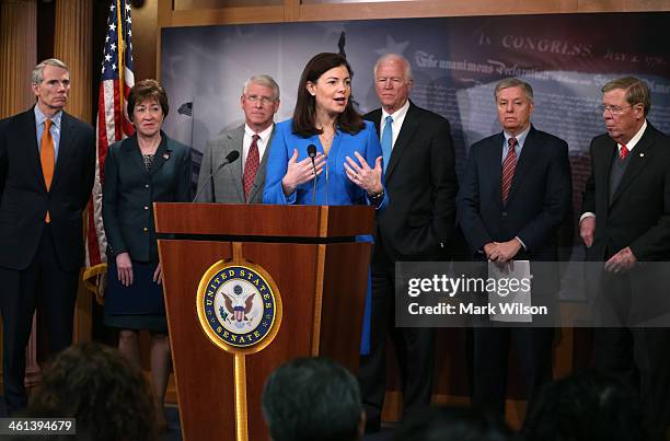 Sen. Kelly Ayotte speaks about unemployment insurance while flanked by Senators , Rob Portman , Susan Collins , Roger Wicker , Saxby Chambliss ,...