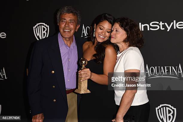 Boxing referee Genaro Rodriguez, actress Gina Rodriguez and Magali Rodriguez attend the 2015 InStyle And Warner Bros. 72nd Annual Golden Globe Awards...