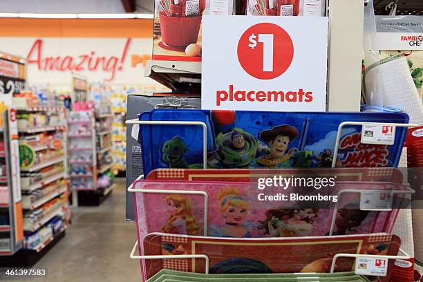 Signage advertising placemats for a dollar are displayed for sale at a Family Dollar Stores Inc. Location in Mansfield, Texas, U.S., on Tuesday, Jan....