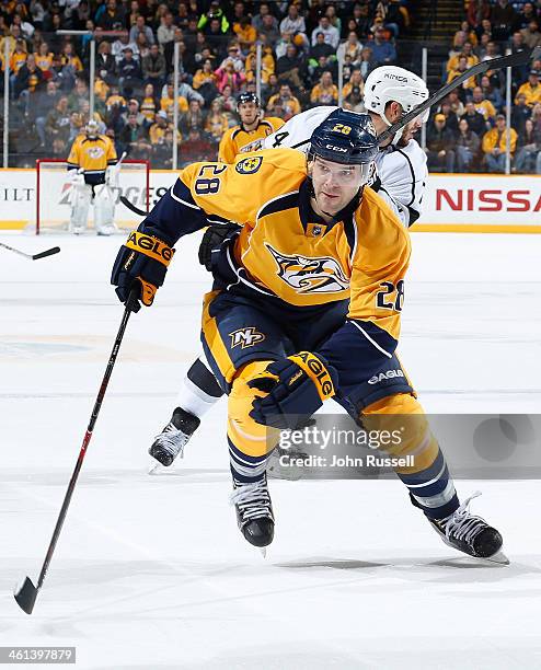 Paul Gaustad of the Nashville Predators skates against the Los Angeles Kings at Bridgestone Arena on December 28, 2013 in Nashville, Tennessee.