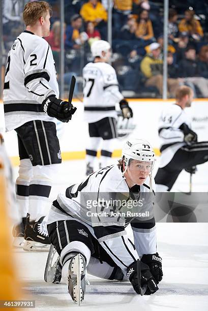 Tyler Toffoli of the Los Angeles Kings stretches in warm-ups prior to a game against the Nashville Predators at Bridgestone Arena on December 28,...