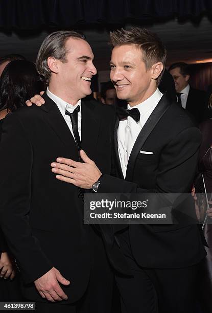 Actors Joaquin Phoenix and Jeremy Renner attend the 2015 InStyle And Warner Bros. 72nd Annual Golden Globe Awards Post-Party at The Beverly Hilton...