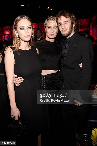 Actress Robin Wright and children Dylan Penn and Hopper Penn attend the 2015 InStyle And Warner Bros. 72nd Annual Golden Globe Awards Post-Party at...