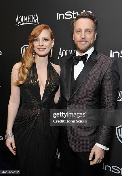 Actress Jessica Chastain and InStyle Editor in Chief Ariel Foxman attend the 2015 InStyle And Warner Bros. 72nd Annual Golden Globe Awards Post-Party...