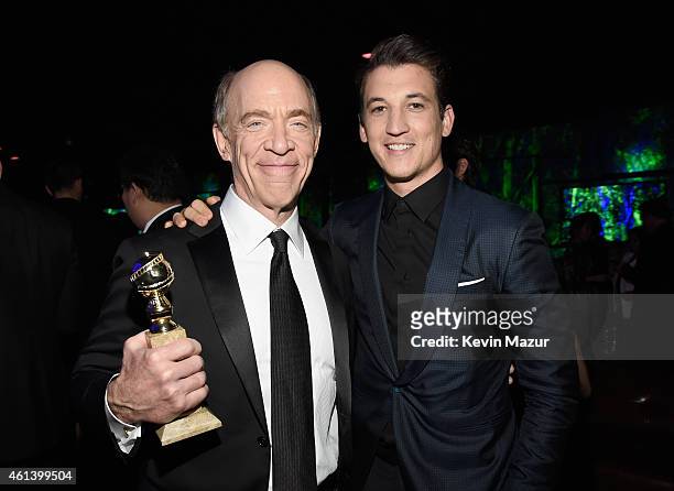 Actors J.K. Simmons and Miles Teller attend the 2015 InStyle And Warner Bros. 72nd Annual Golden Globe Awards Post-Party at The Beverly Hilton Hotel...