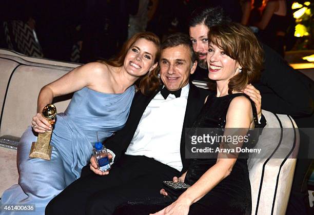 Actress Amy Adams, actor Christophe Waltz, Darren Le Gallo, and Judith Holste attend The Weinstein Company & Netflix's 2015 Golden Globes After Party...
