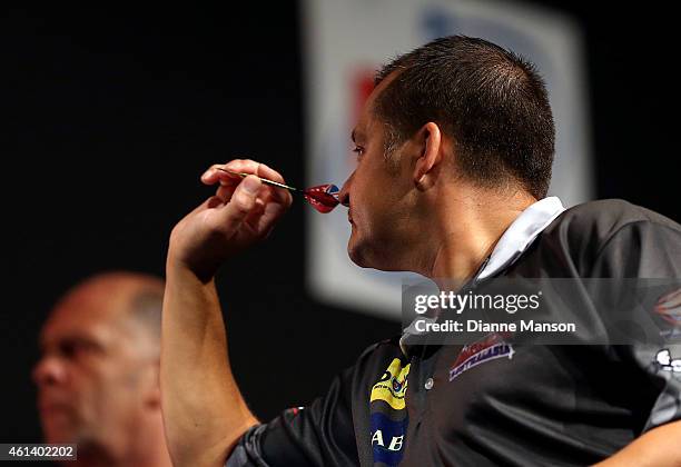 David Platt of Australia in action during the match against Rob Szabo of New Zealand at the Darts King Australasia tournament on January 12, 2015 at...