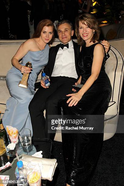 Actress Amy Adams, actor Christophe Waltz, and Judith Holste attend The Weinstein Company & Netflix's 2015 Golden Globes After Party presented by...
