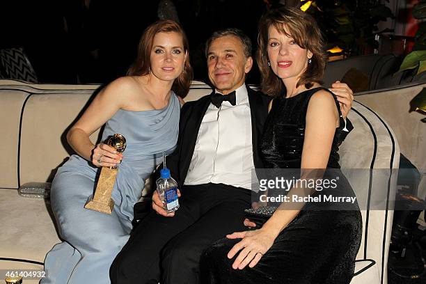 Actress Amy Adams, actor Christophe Waltz, and Judith Holsteattends The Weinstein Company & Netflix's 2015 Golden Globes After Party presented by...