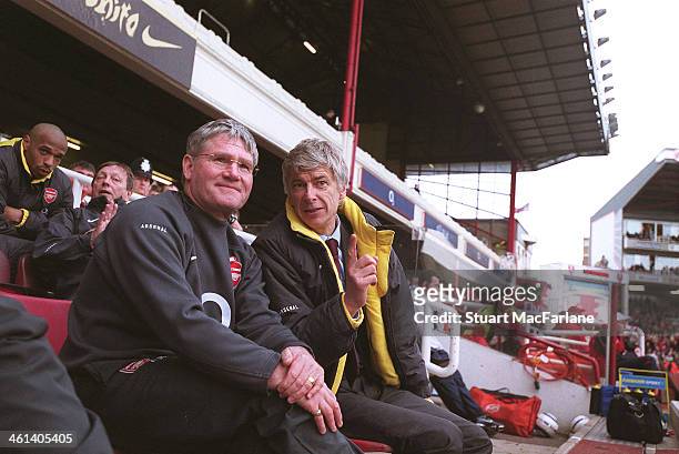 Arsenal manager Arsene Wenger with assistant Pat Rice during the match between Arsenal and Aston Villa at Arsenal Stadium, Highbury on April 1, 2006...