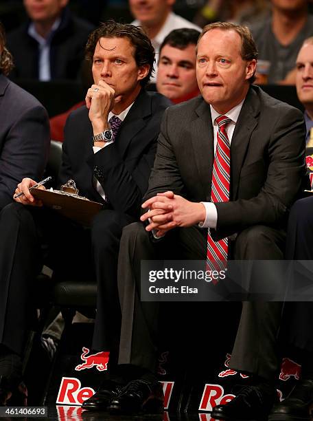 Assistant coach Quin Snyder and head coach Mike Budenholzer of the Atlanta Hawks look on in the second half against the Brooklyn Nets at the Barclays...