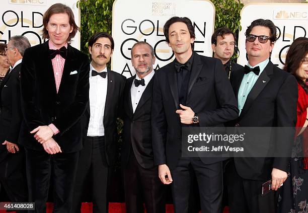 Filmmaker Wes Anderson, actor Jason Schwartzman, guest, Adrien Brody and Roman Coppola attends the 72nd Annual Golden Globe Awards at The Beverly...