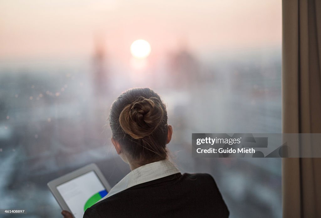 Business woman working with tablet pc.