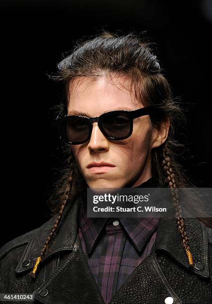 Model walks the runway at the A.Sauvage show during The London Collections: Men Autumn/Winter 2014 on January 8, 2014 in London, England.