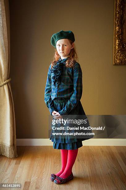 young redheaded girl dressed in plaid outfit - bereit stock pictures, royalty-free photos & images