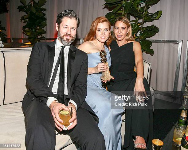 Darren Le Gallo, actress Amy Adams and a guest attend The Beverly Hilton Hotel on January 11, 2015 in Beverly Hills, California.