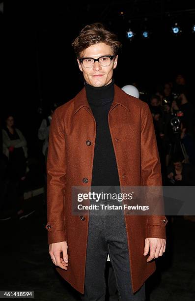 Oliver Cheshire attends the E.Tautz show at the London Collections: Men AW15 at on January 12, 2015 in London, England.