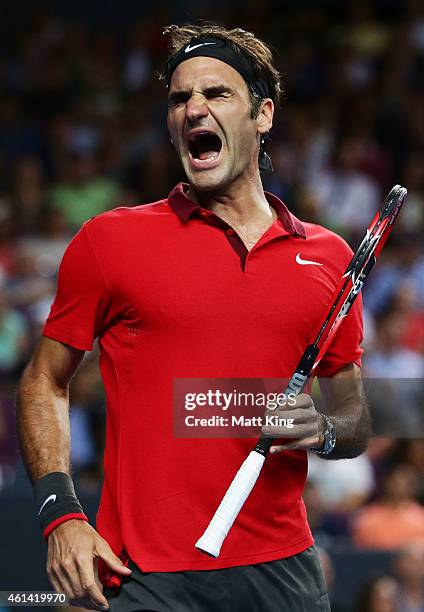 Roger Federer of Switzerland reacts against Lleyton Hewitt of Australia during their match at Qantas Credit Union Arena on January 12, 2015 in...