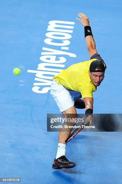 Lleyton Hewitt of Australia plays a backhand against Roger Federer of Switzerland during their match at Qantas Credit Union Arena on January 12, 2015...