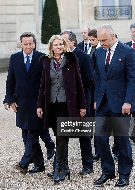 British Prime minister David Cameron and Danish Prime Minister Helle Thorning-Schmidt leave the Elysee Palace to attend a Unity rally 'Marche...