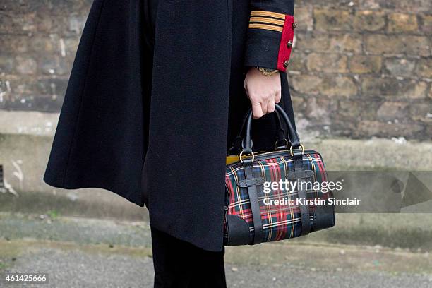 Fashion Editor for the Rake Sarah Ann Murray wearing Ralph Lauren Polo bag, Ralph Lauren coat, Bespoke shirt and shorts and a Suits Supply Tie on day...