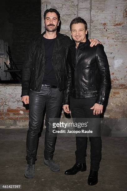 Luca Calvani and actor Jeremy Renner attend Diesel Black Gold fashion show during Pitti Immagine Uomo 85 on January 8, 2014 in Florence, Italy.