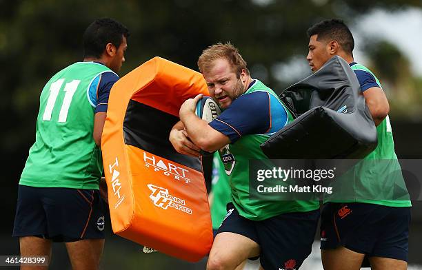 Benn Robinson completes a drill during a Waratahs Super Rugby training sesssion at Moore Park on January 9, 2014 in Sydney, Australia.