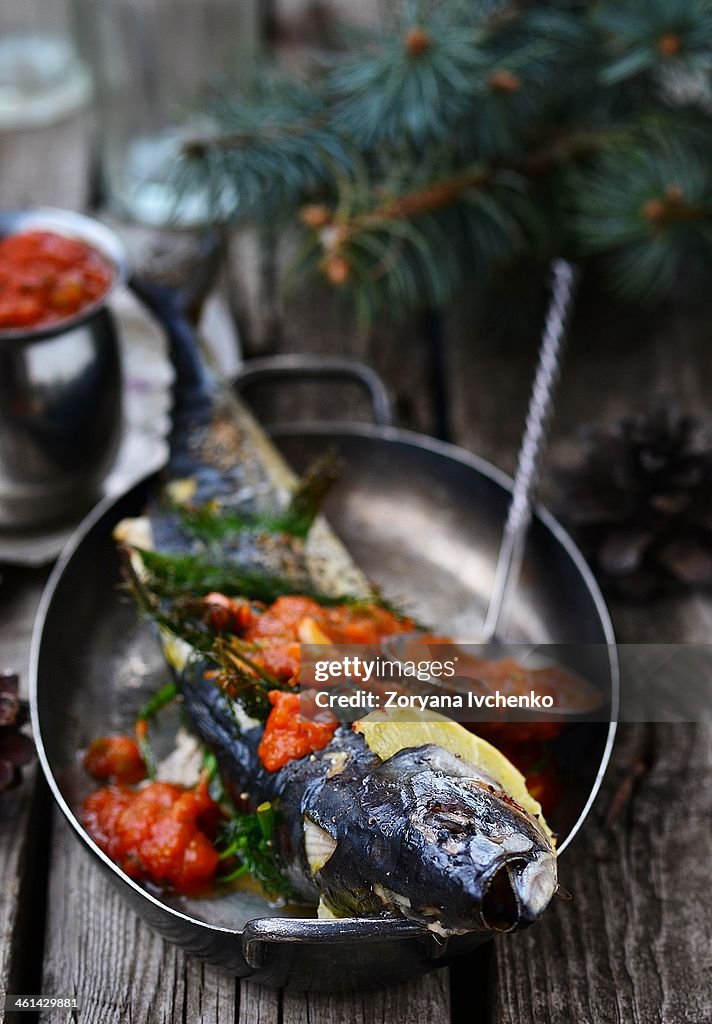 Grill mackerel with tomato sause