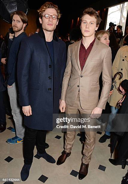 James Norton and George Mackay attend the front row at Burberry Prorsum AW15 London Collections: Men at Kensington Gardens on January 12, 2015 in...