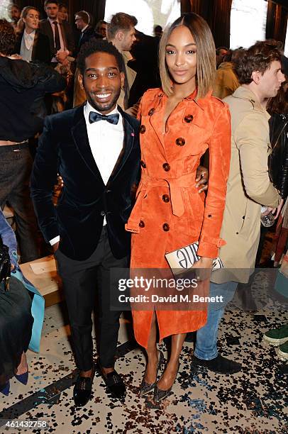 Tinie Tempah and Jourdan Dunn attend the front row at Burberry Prorsum AW15 London Collections: Men at Kensington Gardens on January 12, 2015 in...