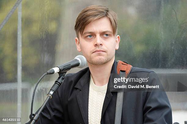 Tenterhook perform outside the Burberry Prorsum AW15 London Collections: Men at Kensington Gardens on January 12, 2015 in London, England.