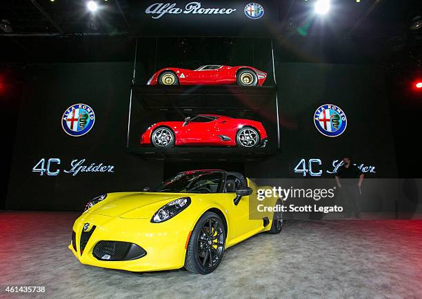 The new Alfa Romeo 4C Spider convertible is revealed to the media at the 2015 North American International Auto Show at Cobo Center on January 12,...