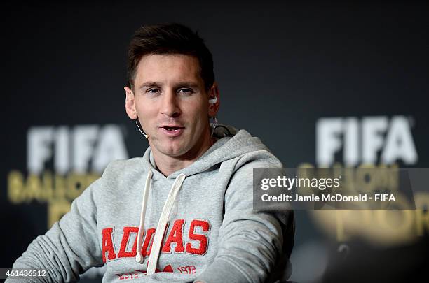 Lionel Messi of Barcelona and Argentina speaks to the media during the nominees press conference for the FIFA Ballon d'Or 2014 prior to the FIFA...