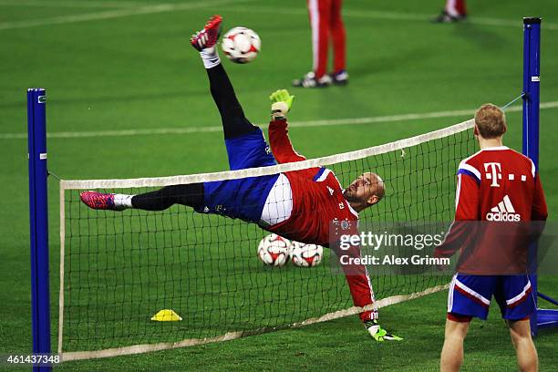 Goalkeeper Pepe Reina tries a bicycle kick during day 4 of the Bayern Muenchen training camp at ASPIRE Academy for Sports Excellence on January 12,...