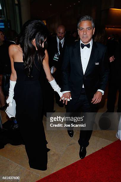Amal Alamuddin Clooney and George Clooney attend The 72nd Annual Golden Globe Awards at The Beverly Hilton Hotel on January 11, 2015 in Beverly...