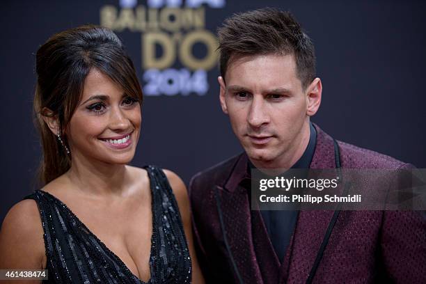 Ballon d'Or nominee Lionel Messi of Argentina and FC Barcelona and his wife Antonella Roccuzzo arrive during the FIFA Ballon d'Or Gala 2014 at the...