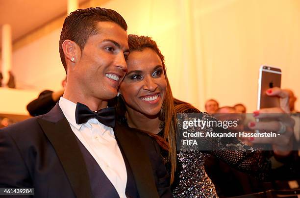 Women's World Player of the Year nominee Marta Vieira da Silva of Brazil and FC Rosengard takes a selfie with FIFA Ballon d'Or nominee Cristiano...