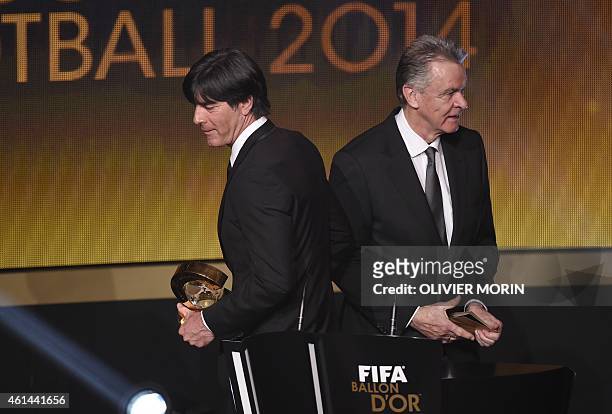 Germany's coach Joachim Loew leaves after receiving from Switzerland's German coach Ottmar Hitzfeld the 2014 FIFA World Coach of the Year for Men's...