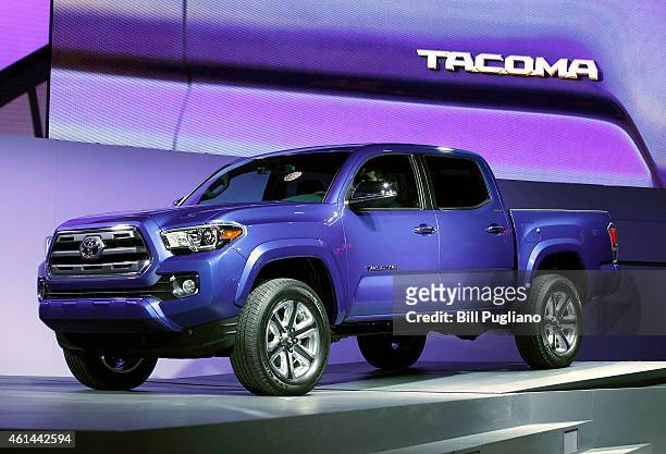 Toyota reveals the new Tacoma midsize pickup truck to the media at the 2015 North American International Auto Show on January 12, 2015 in Detroit,...