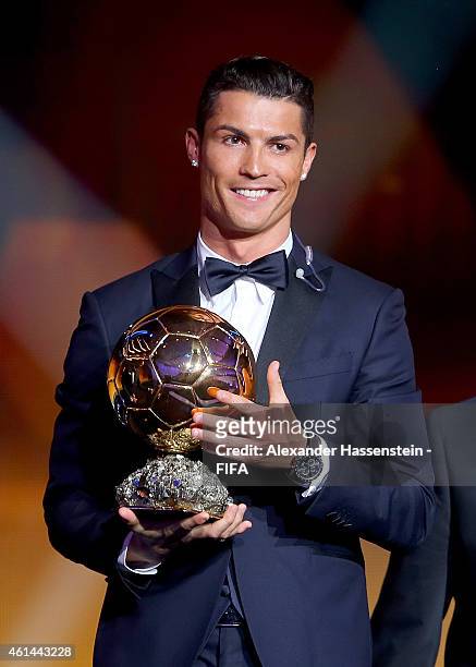 Ballon d'Or winner Cristiano Ronaldo of Portugal and Real Madrid accepts his award during the FIFA Ballon d'Or Gala 2014 at the Kongresshaus on...