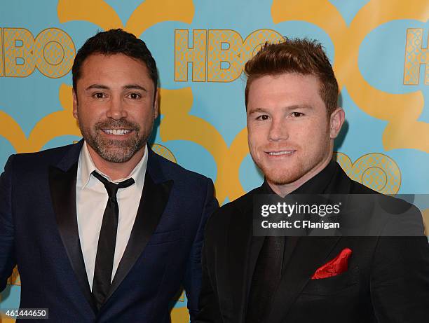 Golden Boy Promotions Founder and President Oscar De La Hoya and professional boxer Canelo Alvarez attend HBO's Official Golden Globe Awards After...