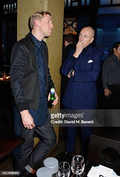 Christopher Raeburn and Dylan Jones attend the GQ London Collections: Men AW15 closing dinner at Hakkasan Hanway Place on January 12, 2015 in London,...