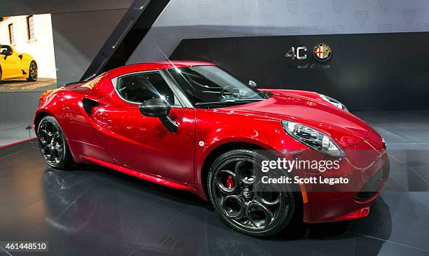 The new Alfa Romeo 4C is revealed to the media at the 2015 North American International Auto Show at Cobo Center on January 12, 2015 in Detroit,...