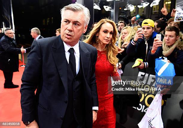 World Coach of the Year for Men's Football nominee Carlo Ancelotti of Italy and Real Madrid and wife Mariann Barrena McClay arrive at the FIFA Ballon...