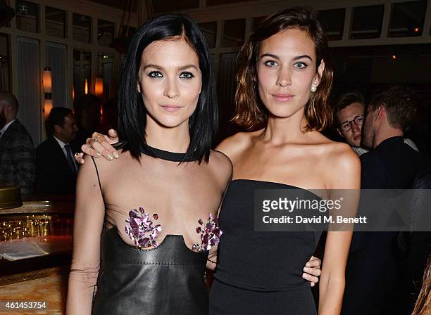 Leigh Lezark and Alexa Chung attend the launch of Tom Ford's new fragrance "Noir Extreme" at The Chiltern Firehouse on January 12, 2015 in London,...