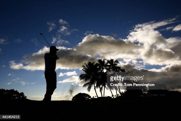 Yuta Ikeda of Japan hits a shot during the Pro-Am round prior to the Sony Open in Hawaii at Waialae Country Club on January 8, 2014 in Honolulu,...