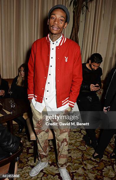 Wiz Khalifa attends the launch of Tom Ford's new fragrance "Noir Extreme" at The Chiltern Firehouse on January 12, 2015 in London, England.